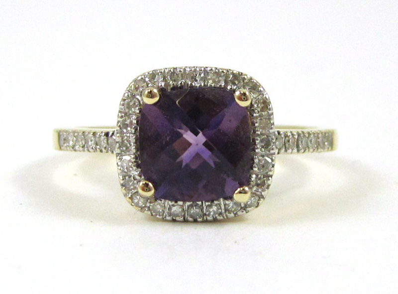 Appraisal: AMETHYST DIAMOND AND FOURTEEN KARAT GOLD RING with round-cut diamonds