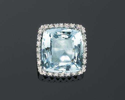 Appraisal: AQUAMARINE AND BRILLIANT-CUT DIAMOND RING White gold Fashionable large ring