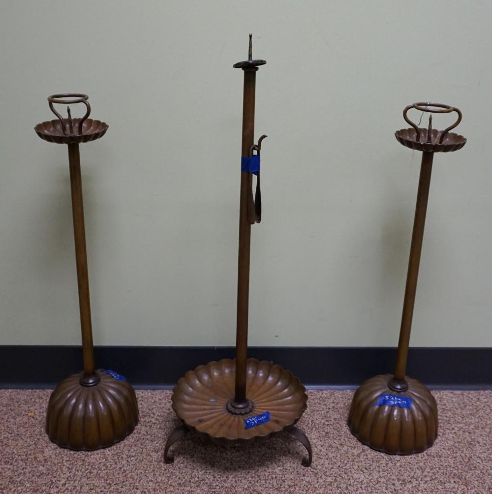 Appraisal: THREE ARTS CRAFTS STYLE PATINATED METAL PRICKET CANDLE STICKS H