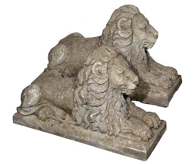 Appraisal: A PAIR OF OLD COMPOSITION GARDEN ORNAMENTS in the form