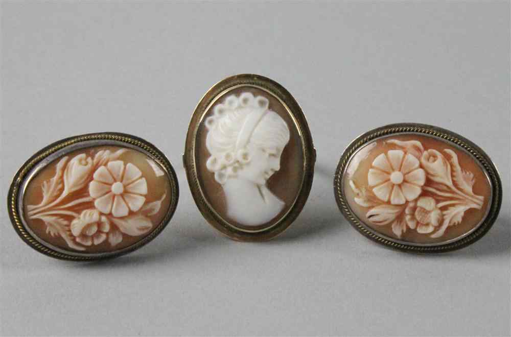 Appraisal: SILVER MOUNTED SHELL CAMEO EARRINGS AND RING each oval cameo