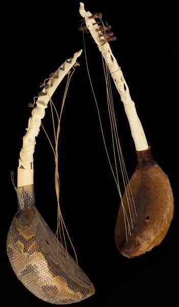 Appraisal: Pair of African Ivory Neck Musical Instruments th century both