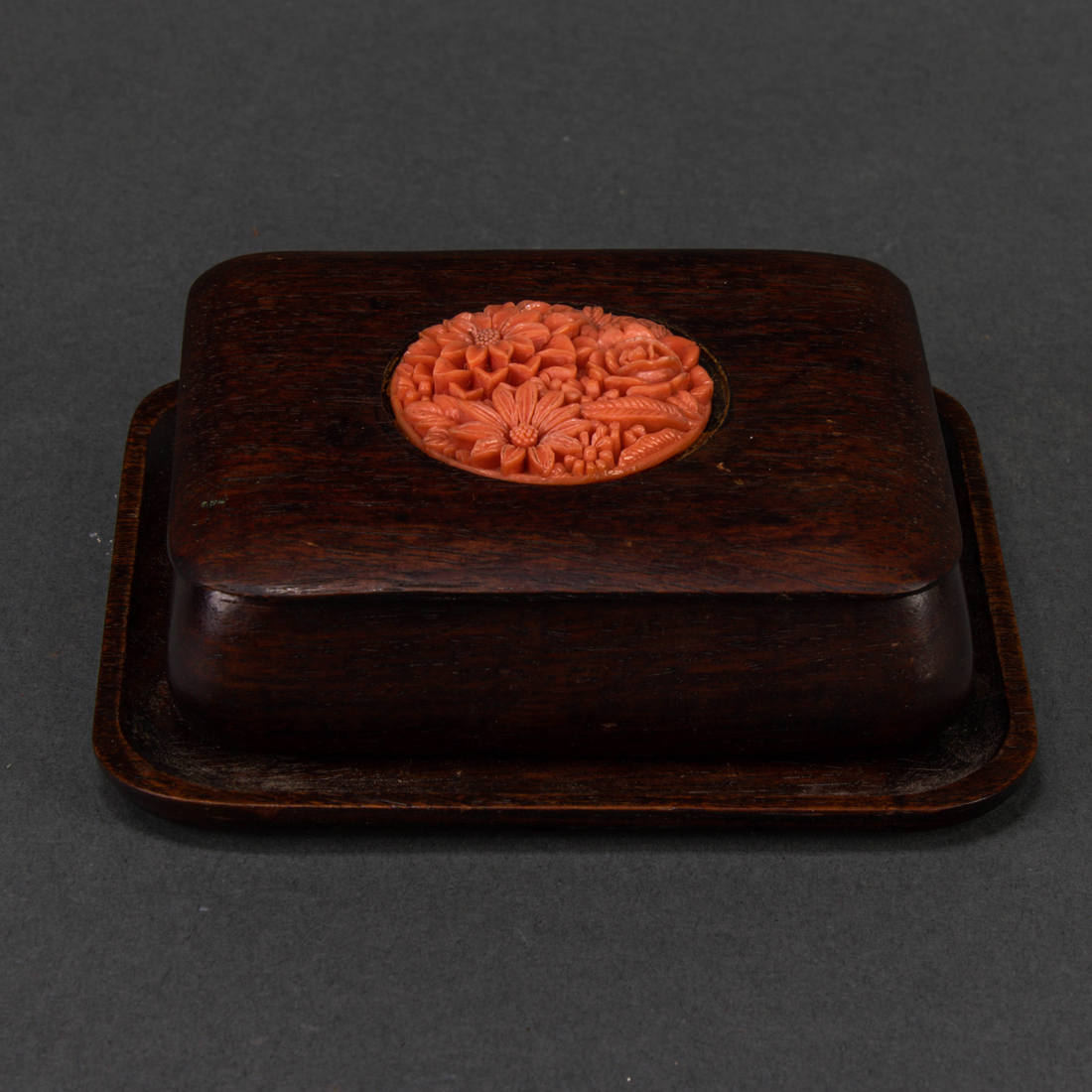 Appraisal: Chinese pink coral pendant carved in high relief with group