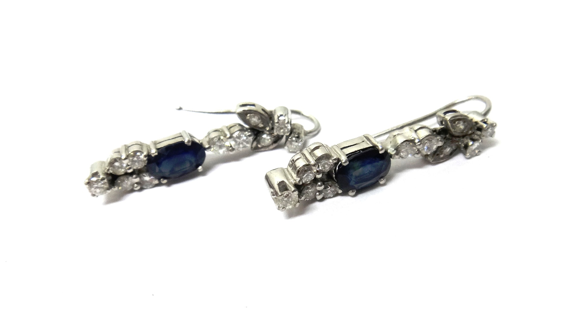 Appraisal: A pair of sapphire and diamond set pendant earrings each