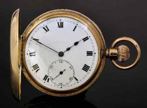 Appraisal: A George V gentleman's ct gold half hunting cased keyless