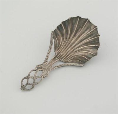 Appraisal: A George IV provincial caddy spoon with a scallop shell