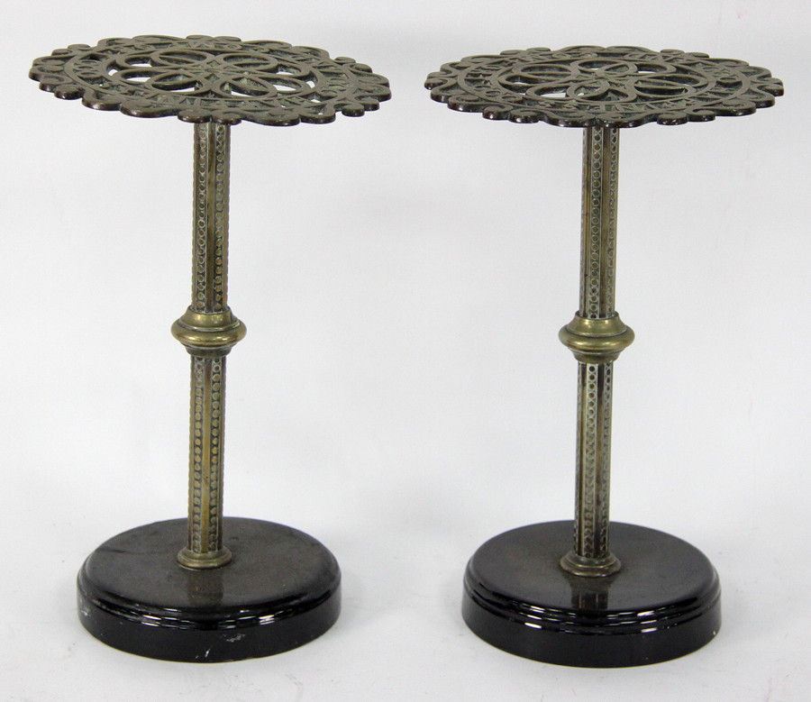 Appraisal: A pair of brass trivets of pierced circular form with