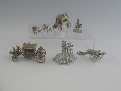 Appraisal: Five miniature toys a modern silvergilt and enamel model of