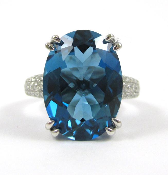 Appraisal: LONDON BLUE TOPAZ AND DIAMOND RING The k white gold