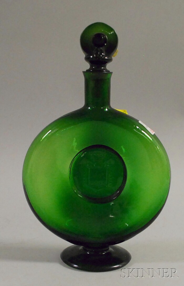 Appraisal: Continental Green Molded Glass Moon Flask Footed Decanter the front