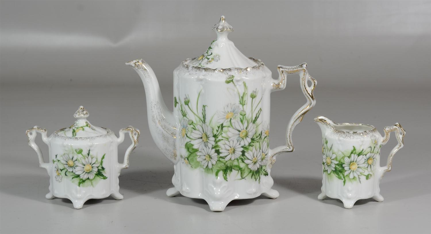 Appraisal: RS Prussia porcelain tea set to include a teapot sugar