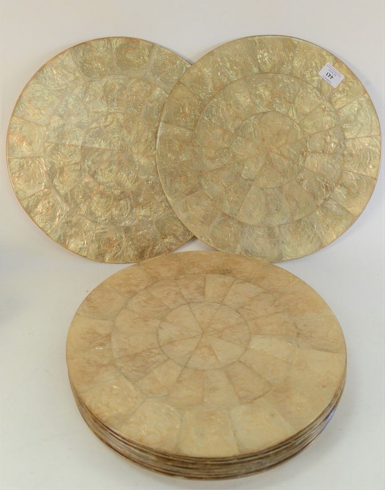 Appraisal: Fourteen Kim Seybert Round Capiz Shell Placemats retails for for