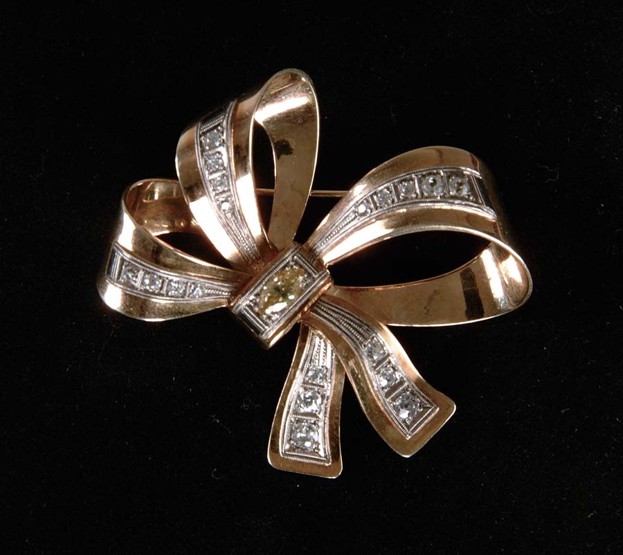 Appraisal: GOLD DIAMOND BOW BROOCH Very impressive k yellow and white