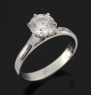 Appraisal: A diamond solitaire ring The round brilliant cut diamond weighing