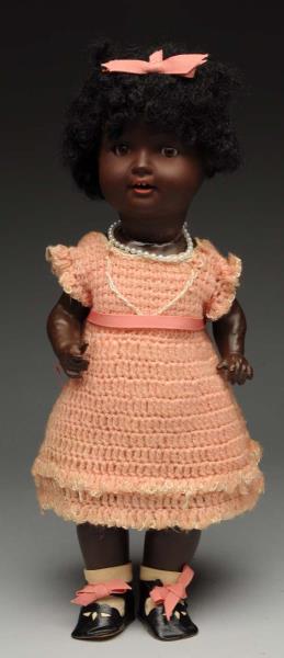 Appraisal: Cute Black Character Doll German pottery sometimes called Bisqueloid character