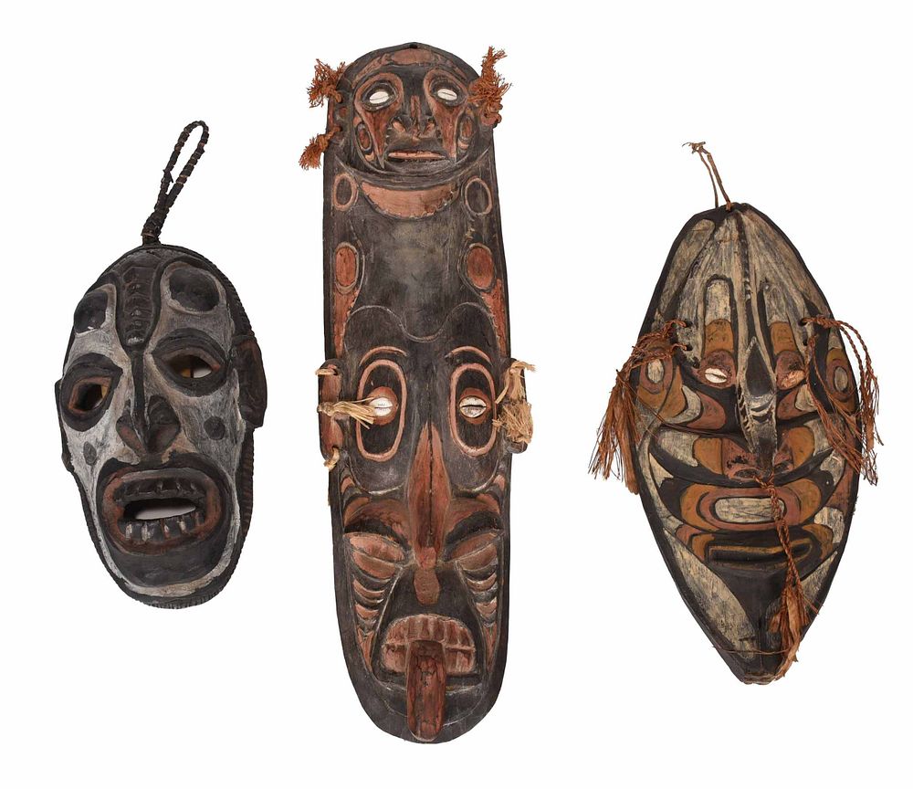 Appraisal: Three Papua New Guinea Carved Polychromed Masks probably Sepik River