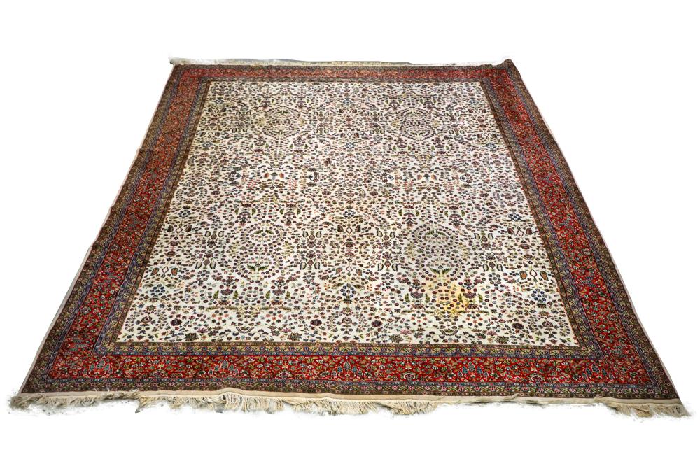 Appraisal: PERSIAN WOOL CARPETbeige field with red border ' x '