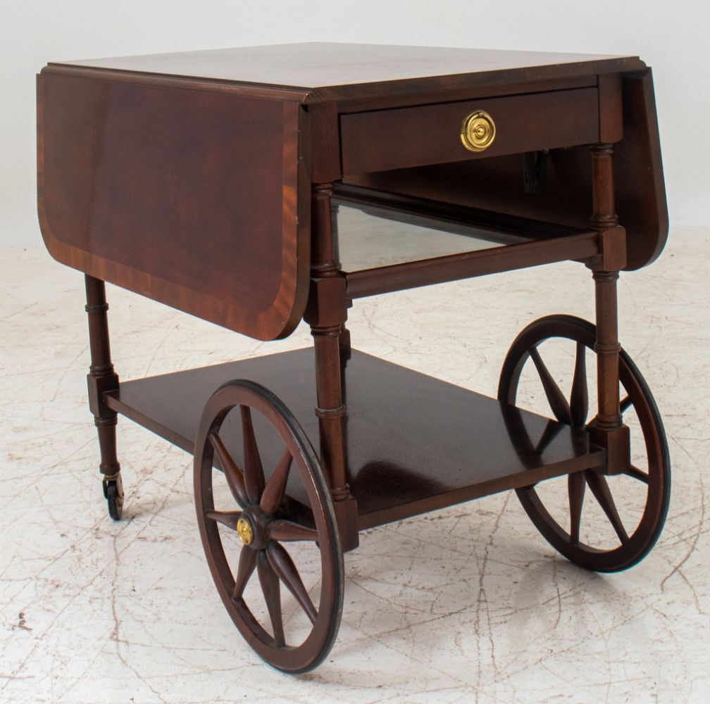 Appraisal: EDWARDIAN STYLE TEA TROLLEY OR COCKTAIL CART Edwardian style tea