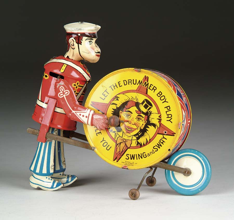 Appraisal: MARX PARADE DRUMMER U S A A very colorful all-tin