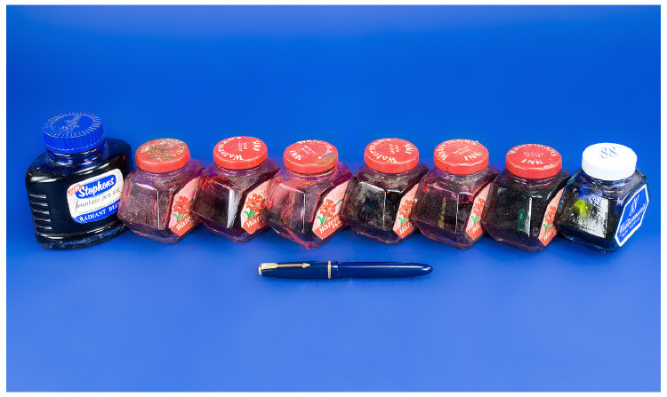 Appraisal: Eight Bottles of Ink bottles of Watermans Red Ink bottle