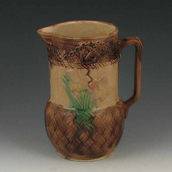 Appraisal: Majolica Flowers and Basket Water Pitcher unmarked ''h chip on