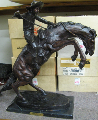 Appraisal: AFTER FREDERIC SACKRIDER REMINGTON American - Bronco Buster patinated bronze