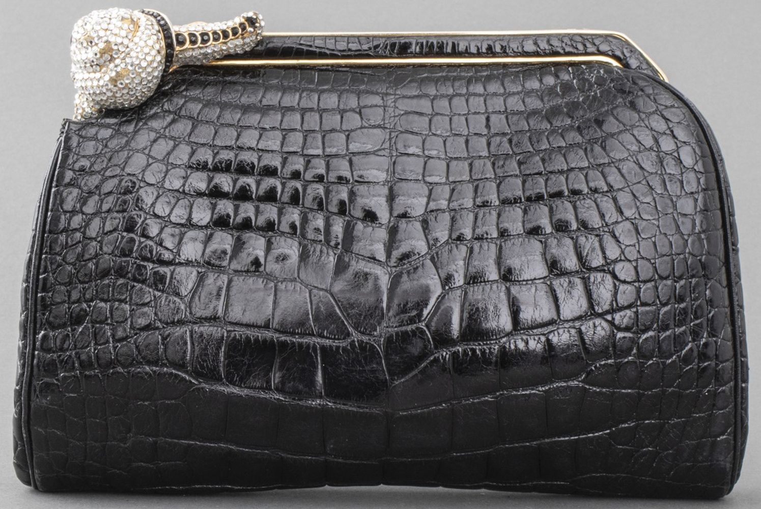 Appraisal: JUDITH LEIBER BLACK ALLIGATOR CLUTCH HANDBAG Judith Leiber black alligator