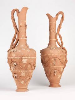 Appraisal: A pair of terracotta ewers th century each with an