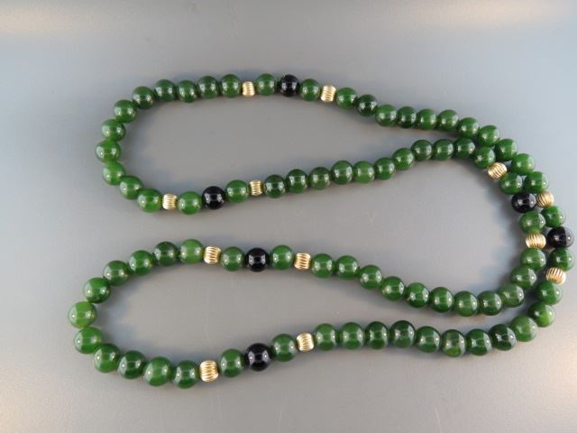 Appraisal: Jade Necklace rich green jade beads mm black onyx beads