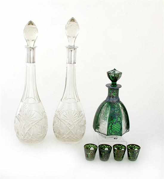 Appraisal: Silver-overlay and mounted decanters silver-overlay and etched green and colorless