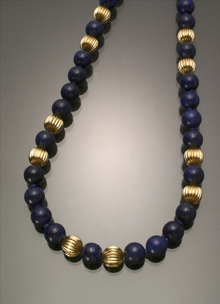 Appraisal: Princess Length Tested -Karat Yellow-Gold and Lapis Lazuli Necklace Knotted