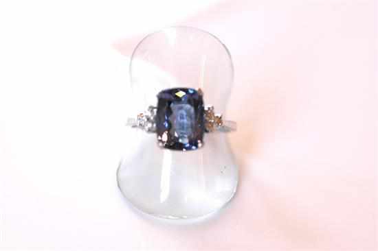 Appraisal: A TANZANITE AND DIAMOND RING IN CT WHITE GOLD TOTAL