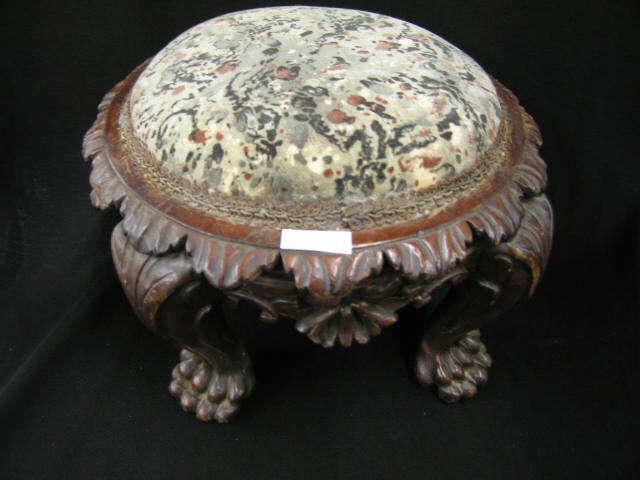 Appraisal: Victorian Carved Mahogany Footstool large lion paw feet round top