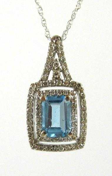 Appraisal: BLUE TOPAZ AND DIAMOND PENDANT NECKLACE suspended on a k