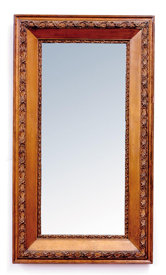 Appraisal: Giltwood and gesso looking glass circa molded frame with floral