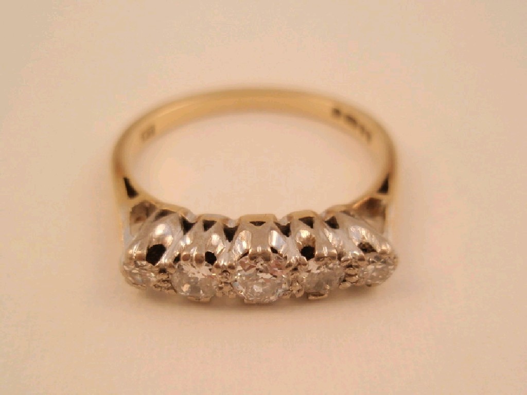 Appraisal: An ct gold five stone in line diamond set ring