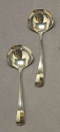 Appraisal: Pair of George VI Sterling Silver Rattail Fiddle Sauce Ladles