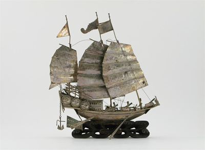 Appraisal: A Chinese silver model of a junk raised on a