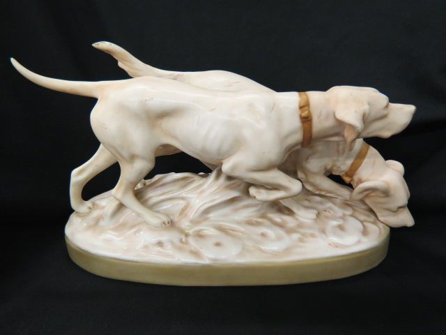 Appraisal: Royal Dux Porcelain Figurine of Two Hunting Dogs satin finish