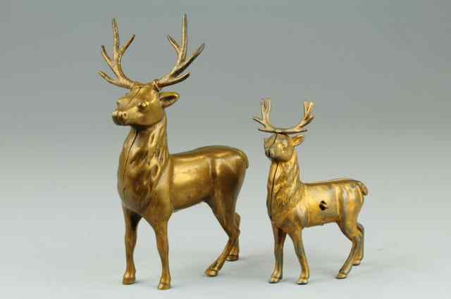 Appraisal: LOT OF TWO REINDEER STILL BANKS Includes large brass example