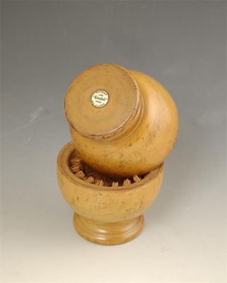 Appraisal: A boxwood 'Kleenball' tennis ball cleaner with inset circular plaque