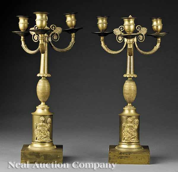 Appraisal: A Pair of French Empire-Style Bronze Three-Light Candelabra drum-form plinths