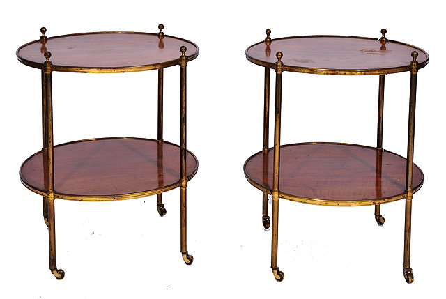 Appraisal: A PAIR OF MAHOGANY AND BRASS BOUND TWO TIER OCCASIONAL