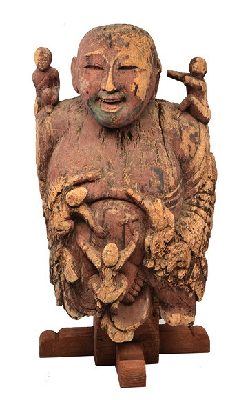 Appraisal: AN ANTIQUE SOUTH EAST ASIAN CARVED WOODEN FIGURE OF A