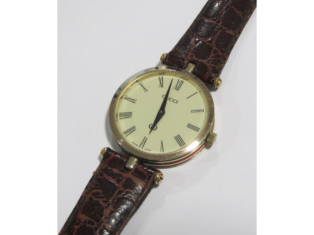 Appraisal: A gents Gucci wrist watch with cream dial black Roman