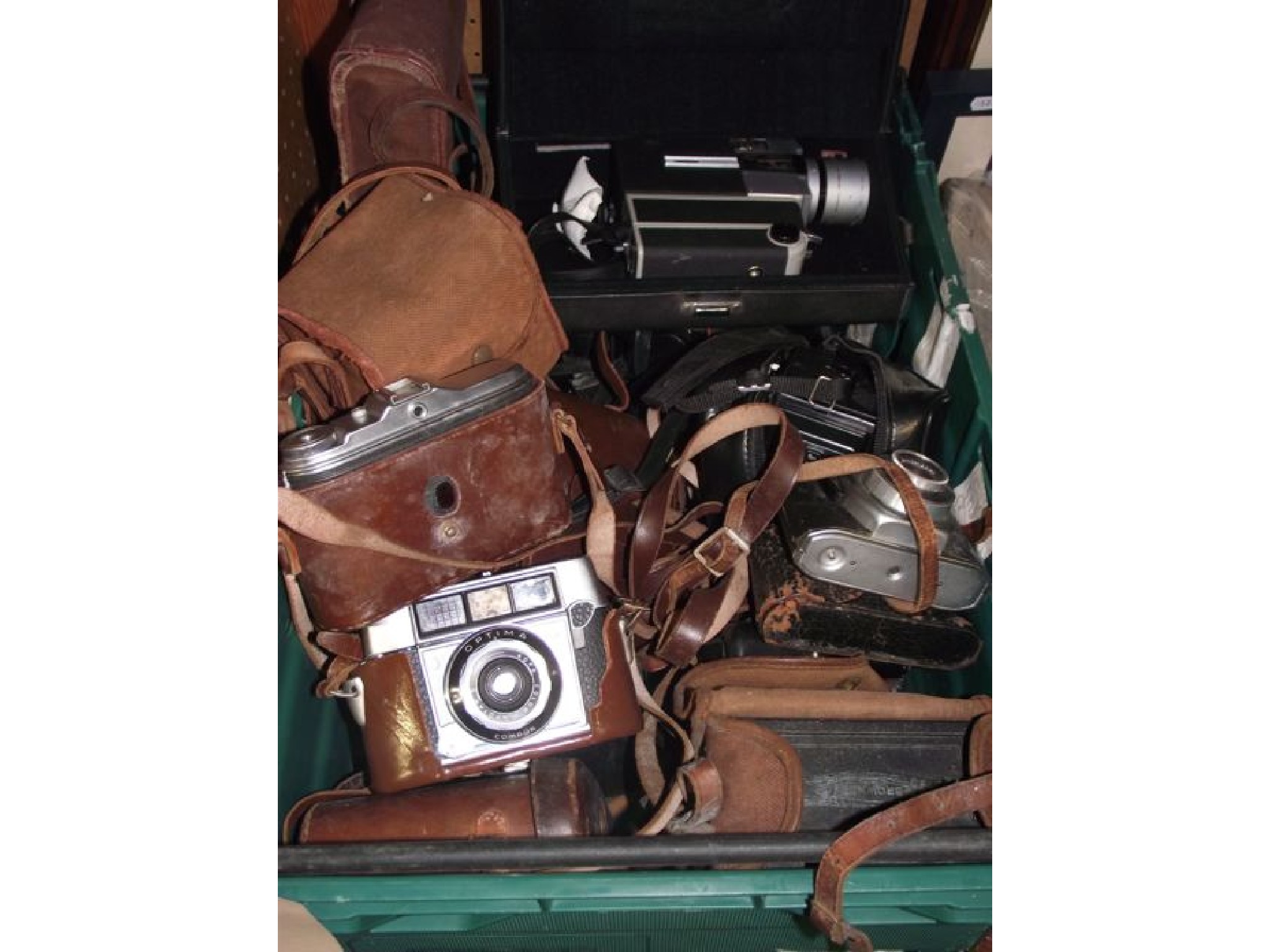 Appraisal: A box containing a quantity of vintage cameras etc to