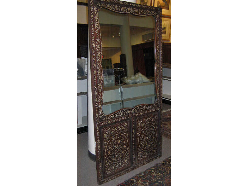 Appraisal: ASIAN HARDWOOD AND MOTHER-OF-PEARL INLAY MIRROR Tall panel with allover