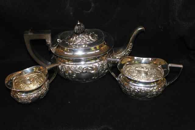 Appraisal: A SILVER THREE PIECE TEASET of baluster form with shaped