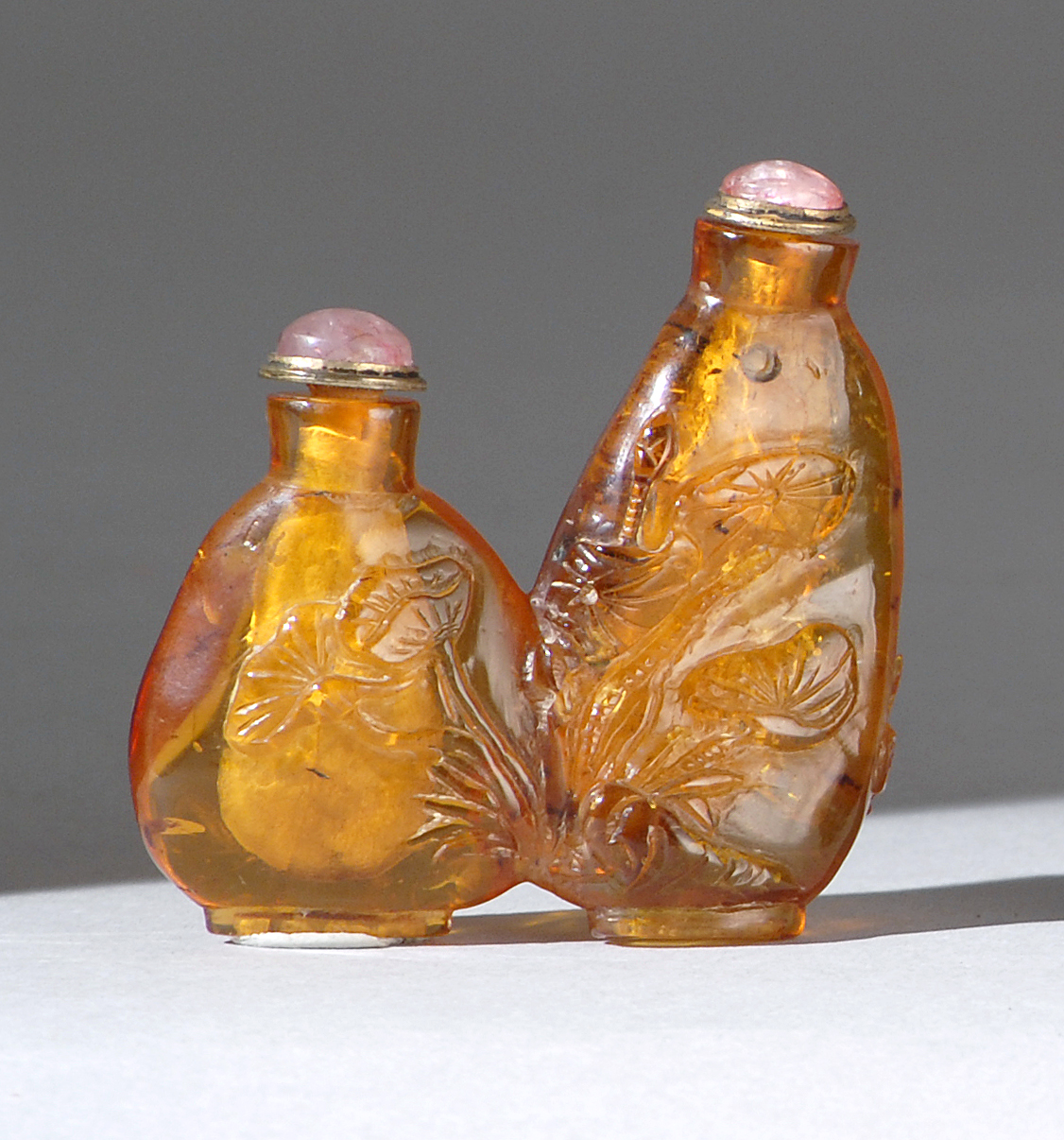 Appraisal: AMBER DOUBLE SNUFF BOTTLE In the form of two small