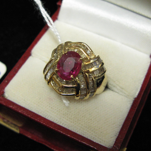 Appraisal: RUBY DIAMOND AND FOURTEEN KARAT GOLD RING The domed setting